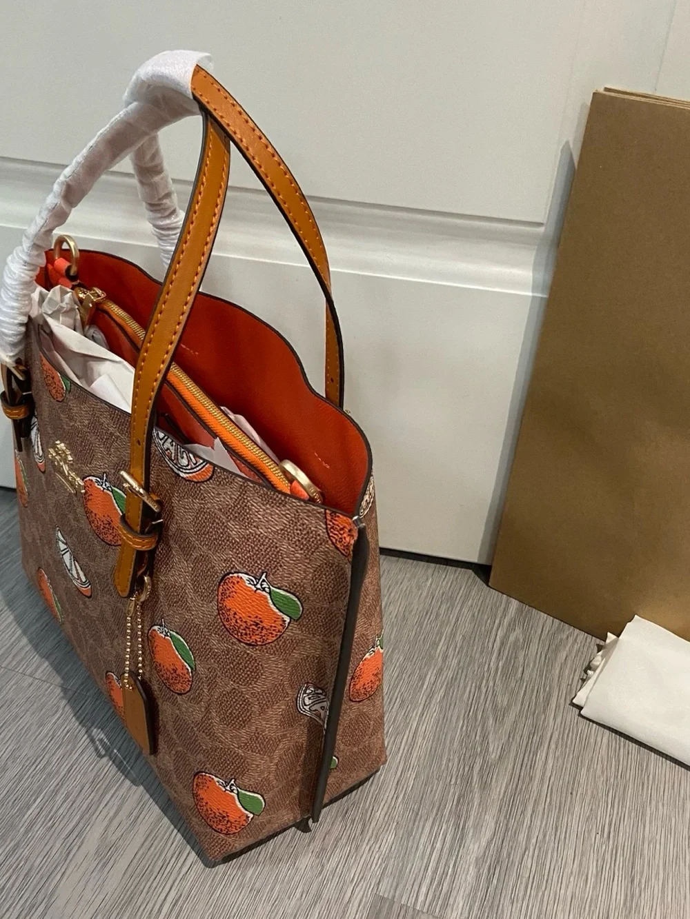 Coach Brown Monogram Tote with Orange Fruit Print